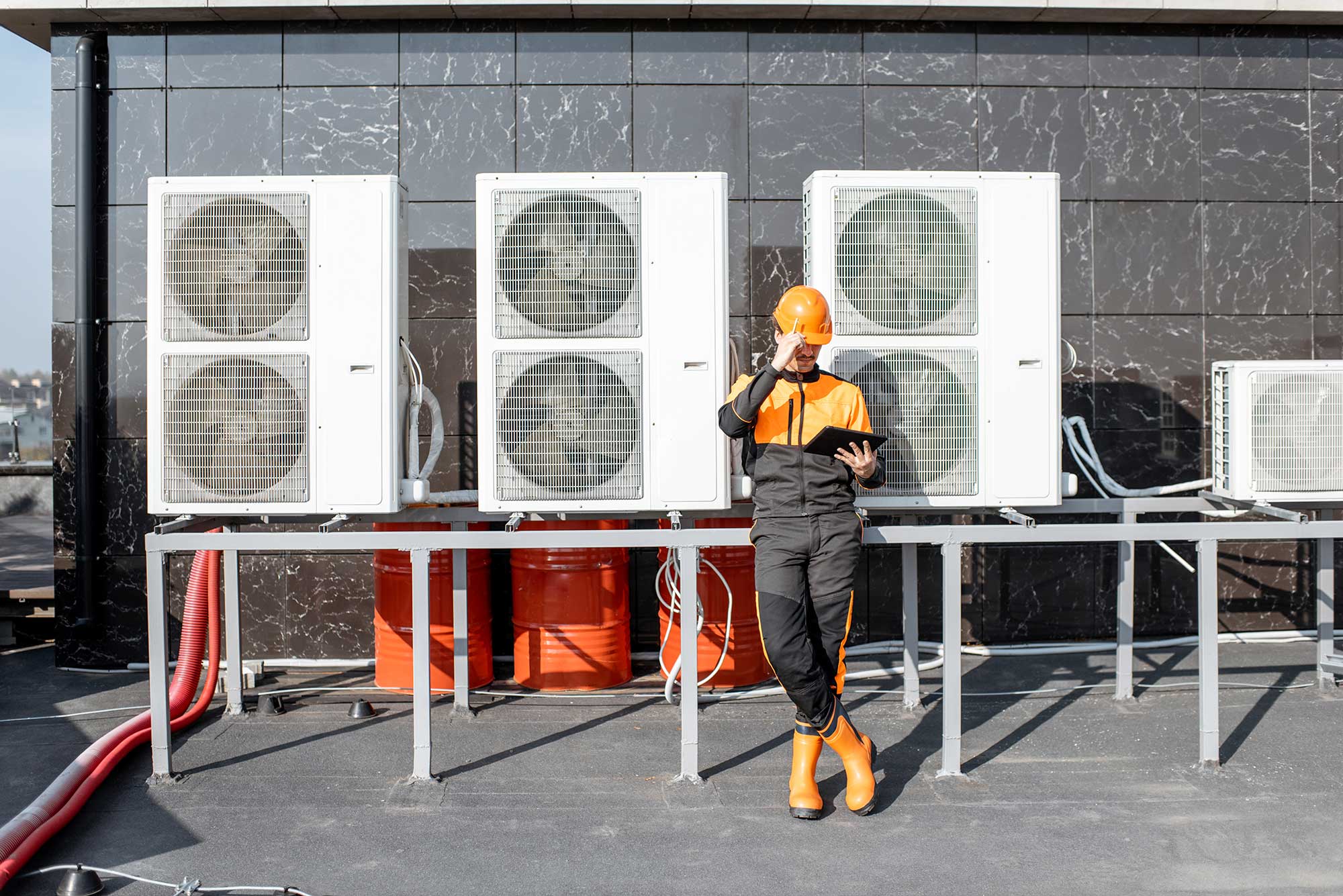 workman-servicing-air-conditioning-or-heat-pump-wi-2021-09-01-16-05-40-utc